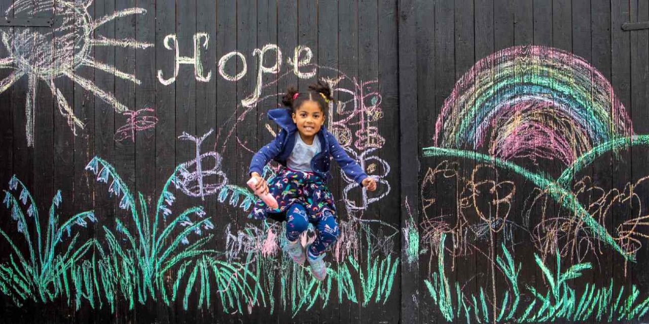 5-Year-Old Draws Messages of Hope on Garage During Lockdown