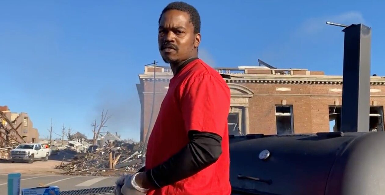 Man Loads Grill in Truck to Help Tornado Victims